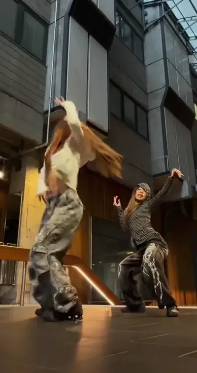 Two dancers, one photo each. — One shared line